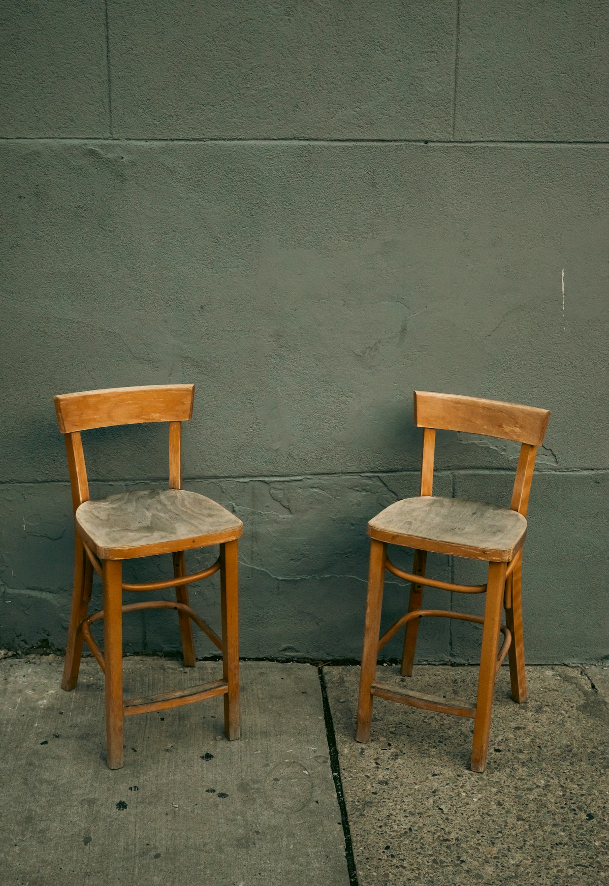 Two chairs, with a little room for a conversation